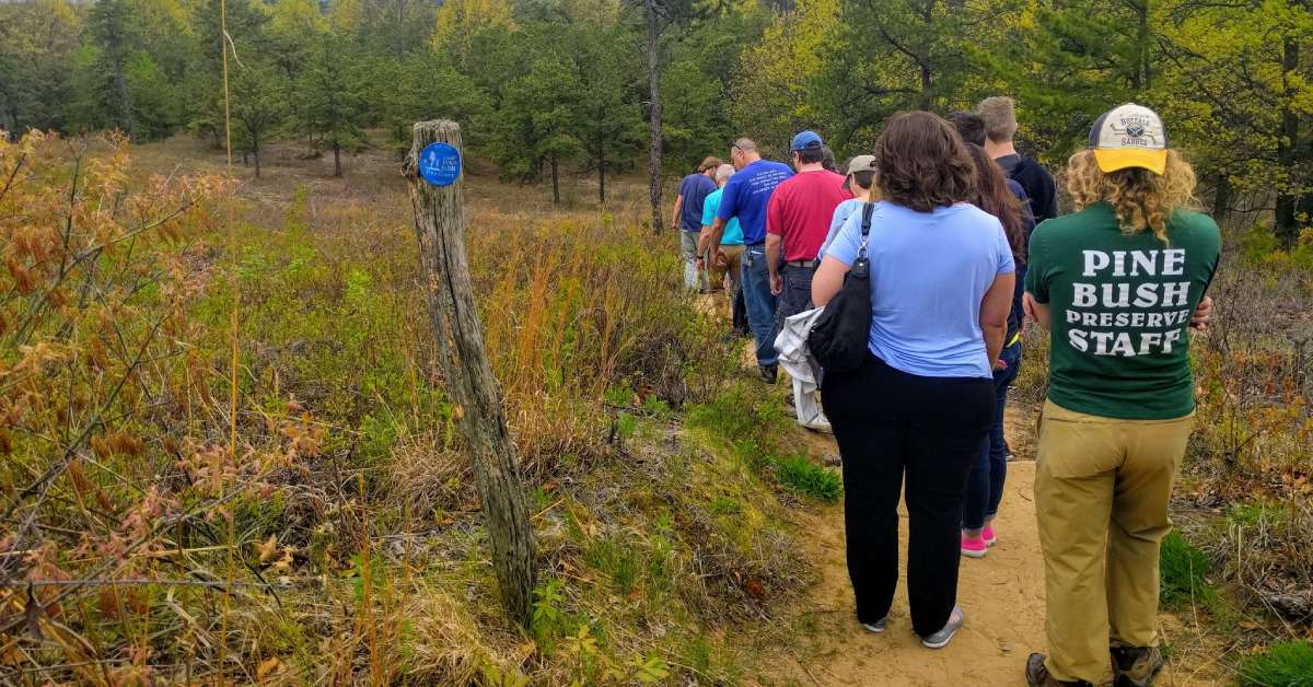 group of people in a nature preserve