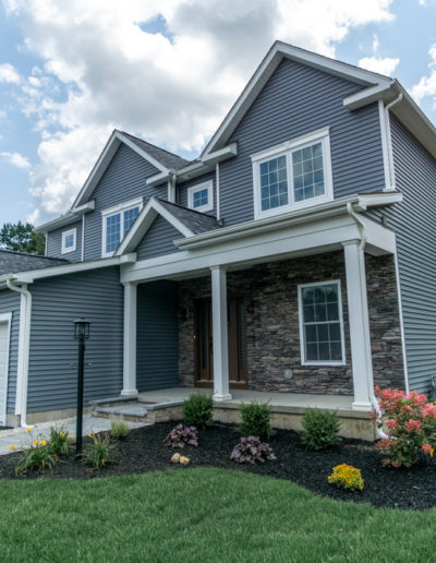 exterior of blue custom home