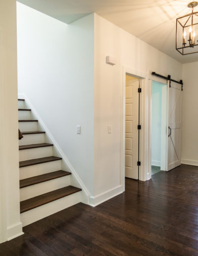 foyer with stairway and barn door