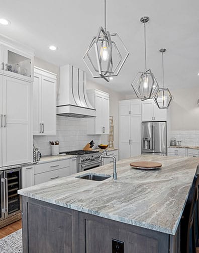 Kitchen with gray and white granite countertops